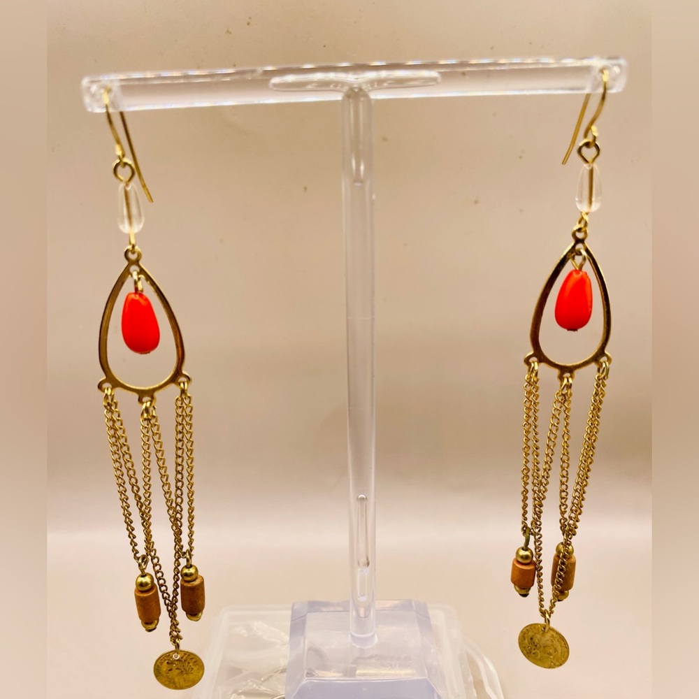 Boho chandelier drop dangle earring with orange bead, brown tubes, and a coin